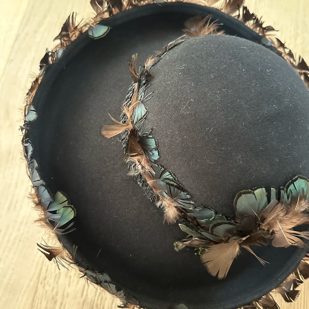 Elegant Black Hat with Feather Accents